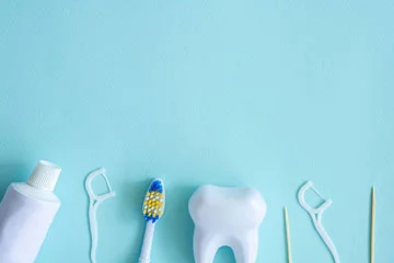 toothbrush, toothpaste, dental floss